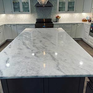 Mackson Marble Countertops white cabinets.JPG Mackson Marble Granite